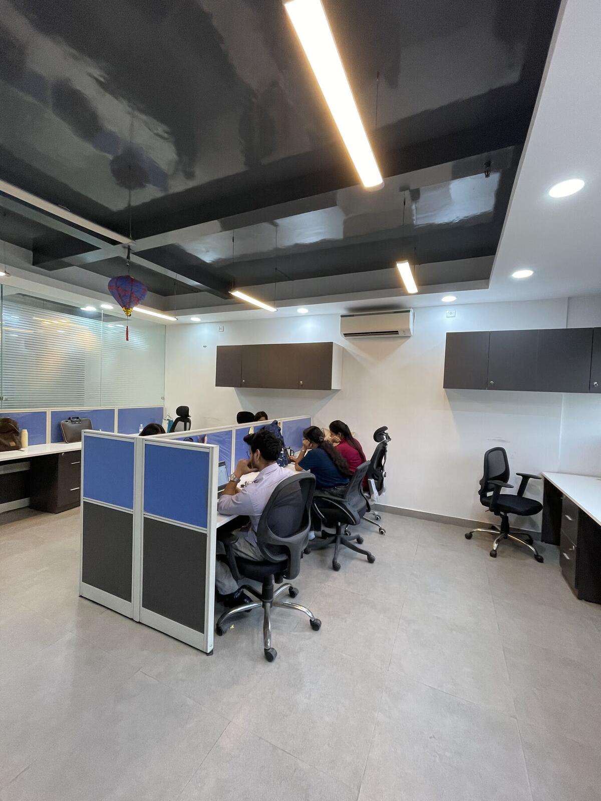 Shared team desk cluster with city views