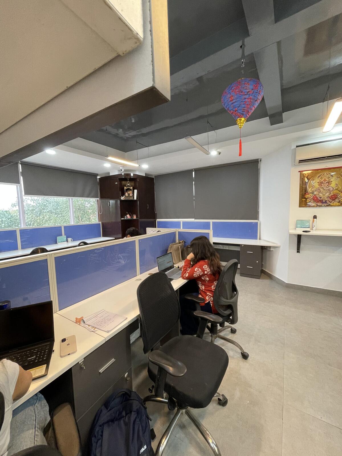 Open desk bay at Alliance Co-Working with individual workstations